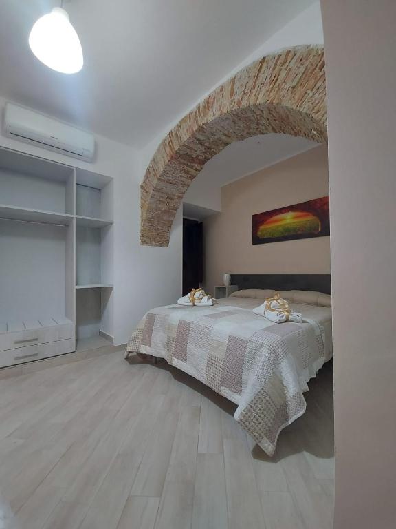 Postel nebo postele na pokoji v ubytování KALGHEROS Luxury Rooms