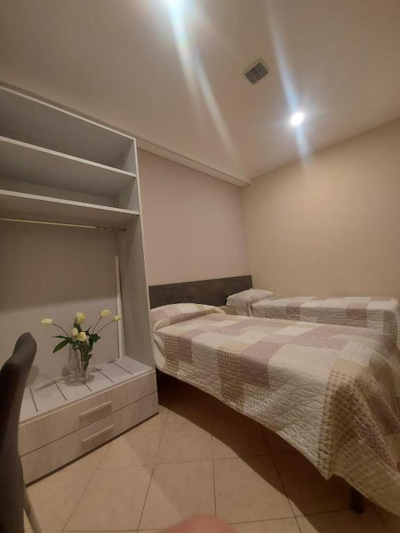Postel nebo postele na pokoji v ubytování KALGHEROS Luxury Rooms