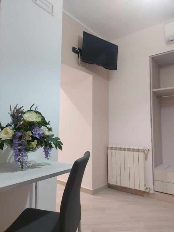 TV a/nebo společenská místnost v ubytování KALGHEROS Luxury Rooms