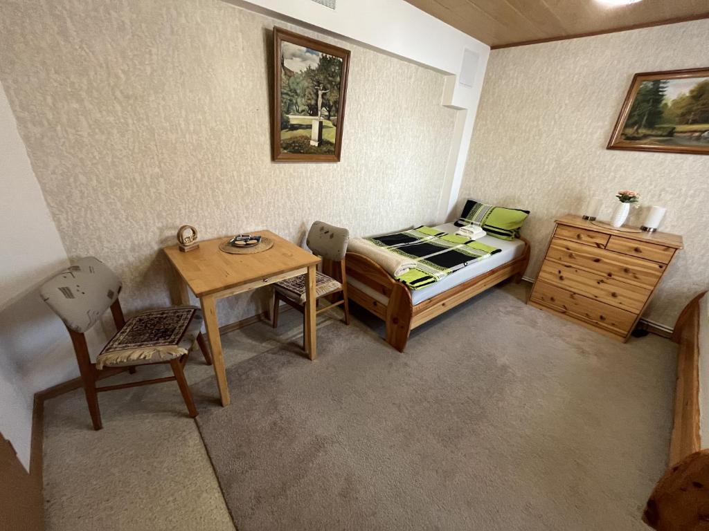 Postel nebo postele na pokoji v ubytování Gasthaus Katrin