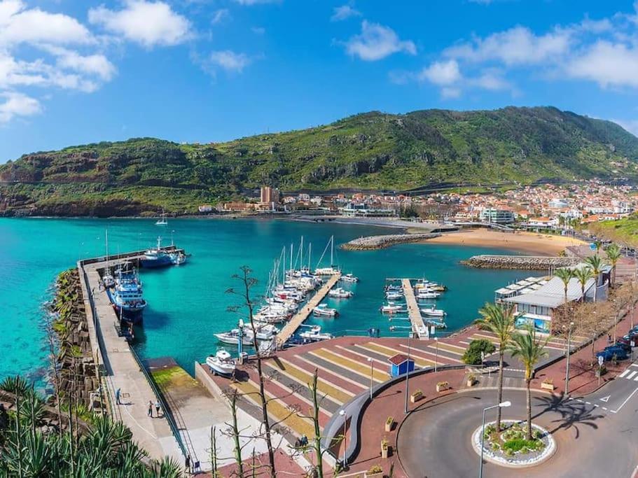 a view of a harbor with boats in the water at Machico center w/ terrace 5 min beach in Machico