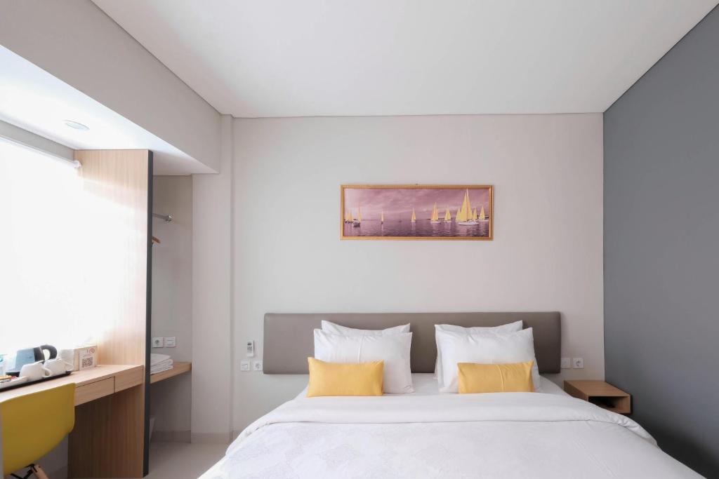 Postel nebo postele na pokoji v ubytování S101 Hotels