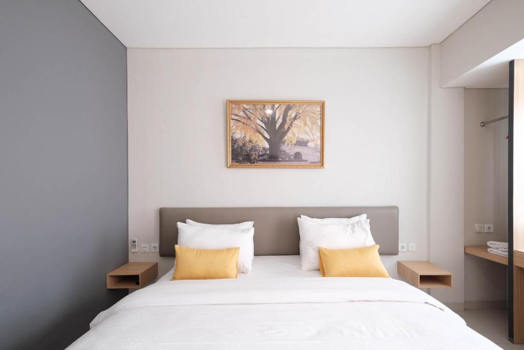 Postel nebo postele na pokoji v ubytování S101 Hotels