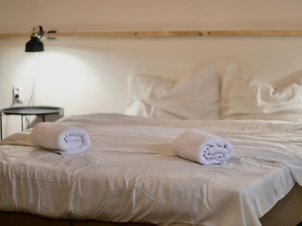 Postel nebo postele na pokoji v ubytování Forty40 Residence