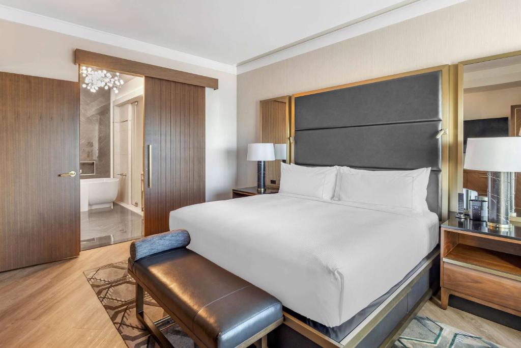 Ein Bett oder Betten in einem Zimmer der Unterkunft Hilton Club Elara Las Vegas