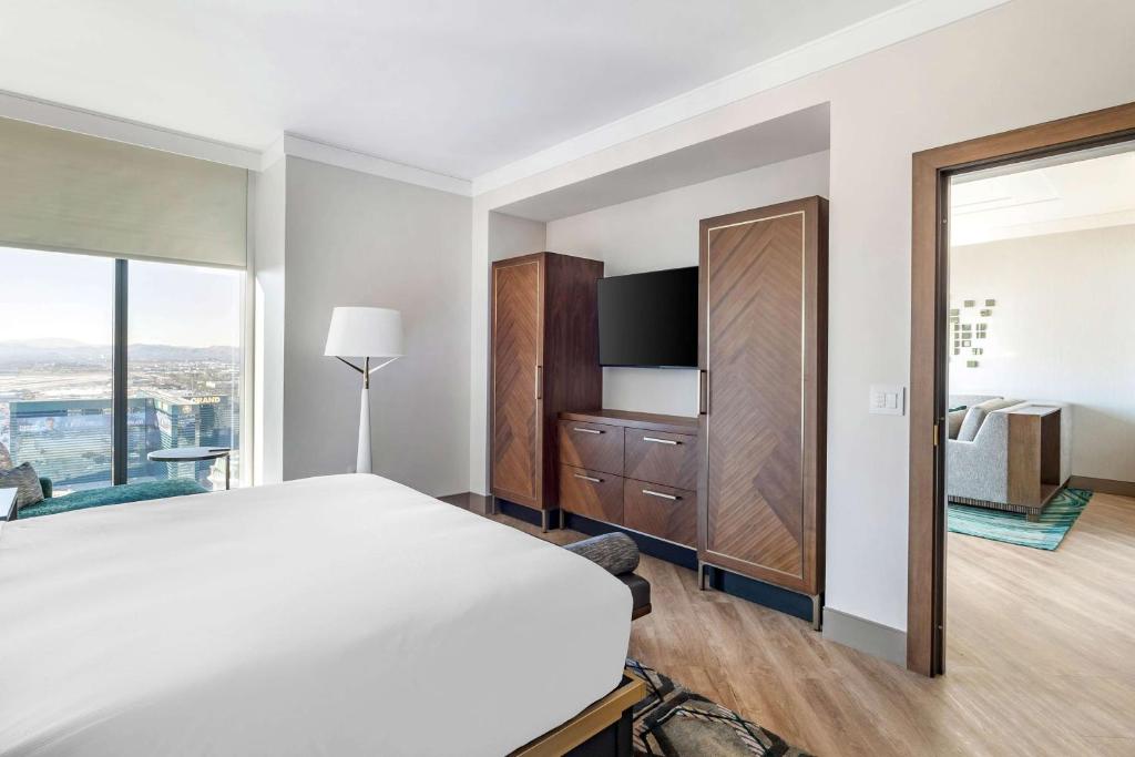Ein Bett oder Betten in einem Zimmer der Unterkunft Hilton Club Elara Las Vegas