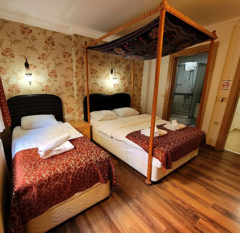 Postel nebo postele na pokoji v ubytování Marmara Guesthouse