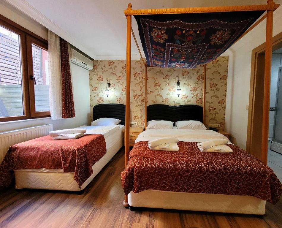 Postel nebo postele na pokoji v ubytování Marmara Guesthouse
