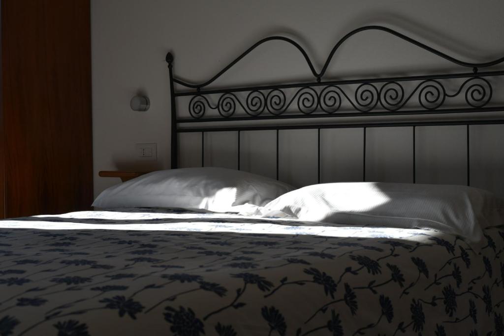 Postel nebo postele na pokoji v ubytování B&B Convivium