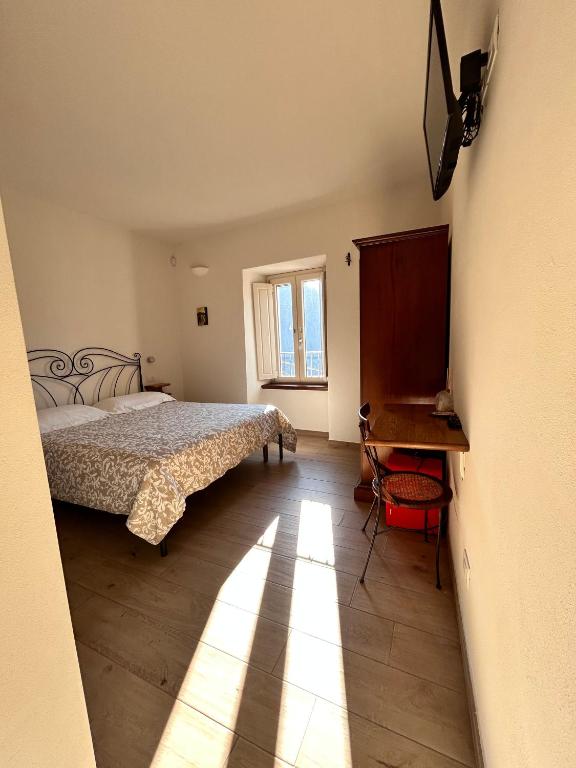 Postel nebo postele na pokoji v ubytování B&B Convivium