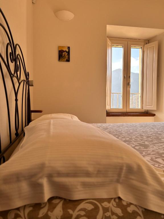 Postel nebo postele na pokoji v ubytování B&B Convivium