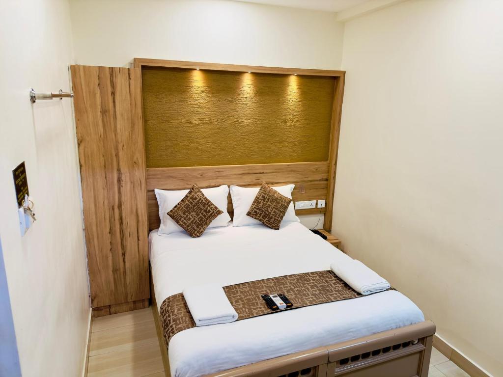 Postel nebo postele na pokoji v ubytování Stay Court - Business Class Hotel - Near Central Railway Station