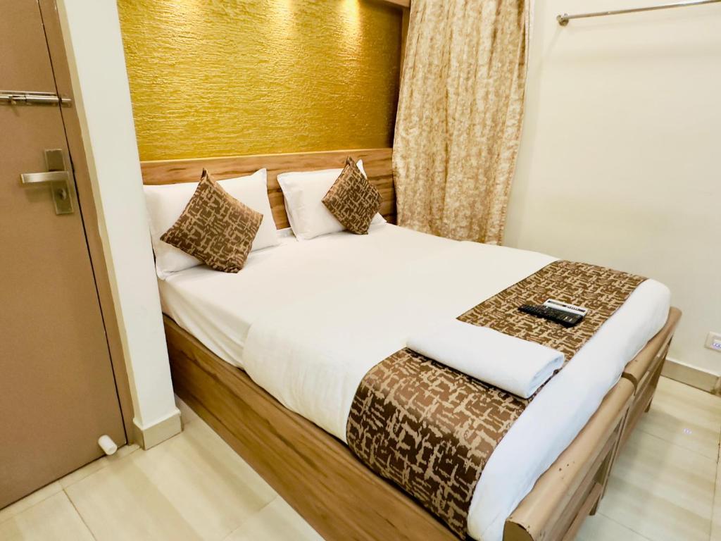 Postel nebo postele na pokoji v ubytování Stay Court - Business Class Hotel - Near Central Railway Station