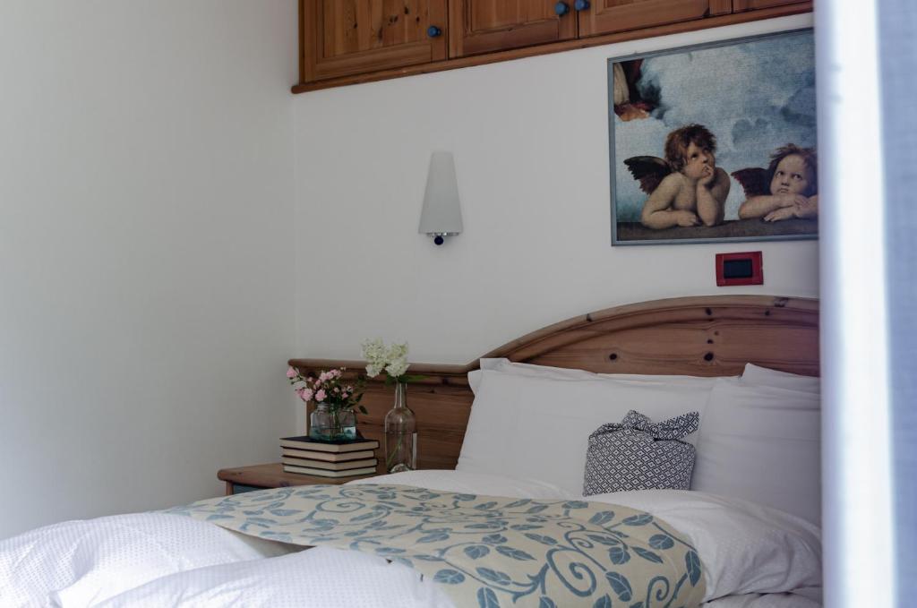 Posteľ alebo postele v izbe v ubytovaní Hotel Bella di Bosco