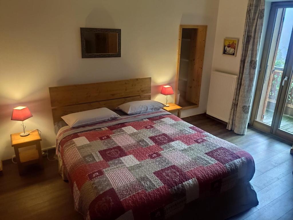 Postel nebo postele na pokoji v ubytování Les Chemins du Léman