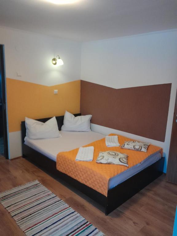 Voodi või voodid majutusasutuse Apartamente Ambrus E Studio 21 Praid toas