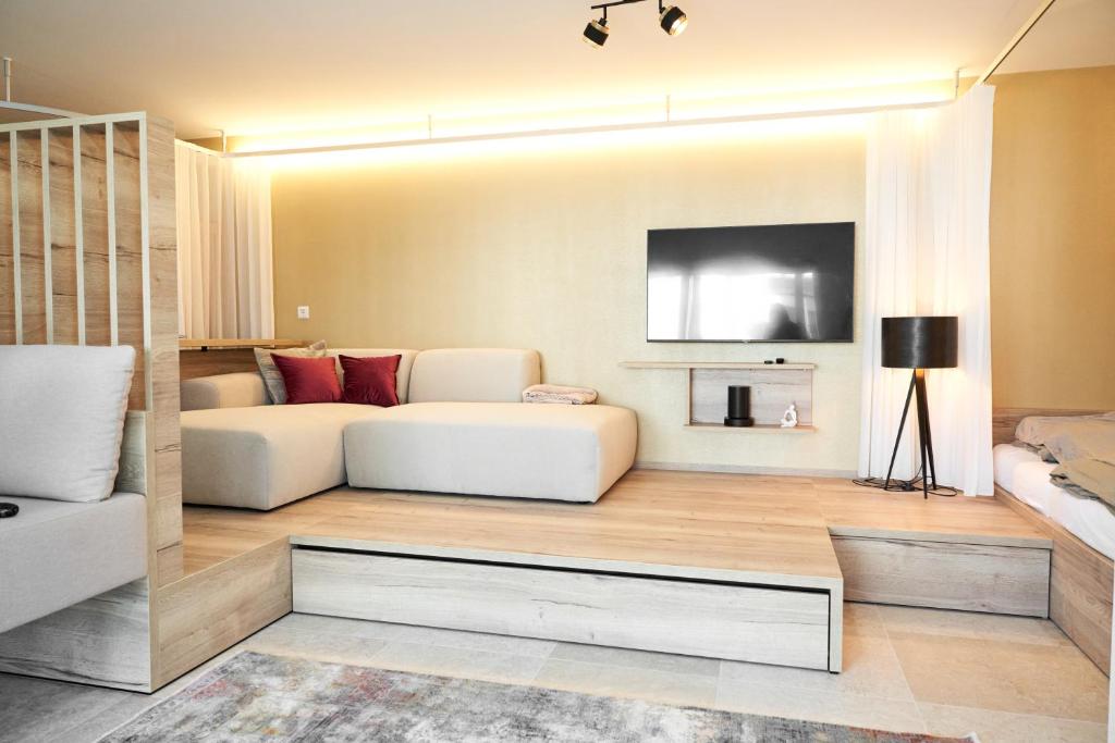 TV a/nebo společenská místnost v ubytování Finy Homes Stegersbach
