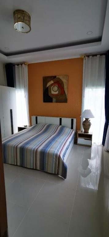 Postel nebo postele na pokoji v ubytování Big swimming pool garden villa 私家泳池花园豪华别墅