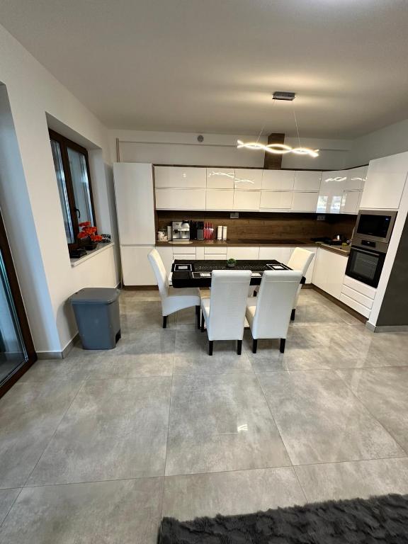 Kuchyň nebo kuchyňský kout v ubytování VRG 1 Exkluzív Apartman