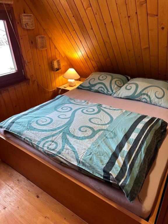 Postel nebo postele na pokoji v ubytování Domek na Polance