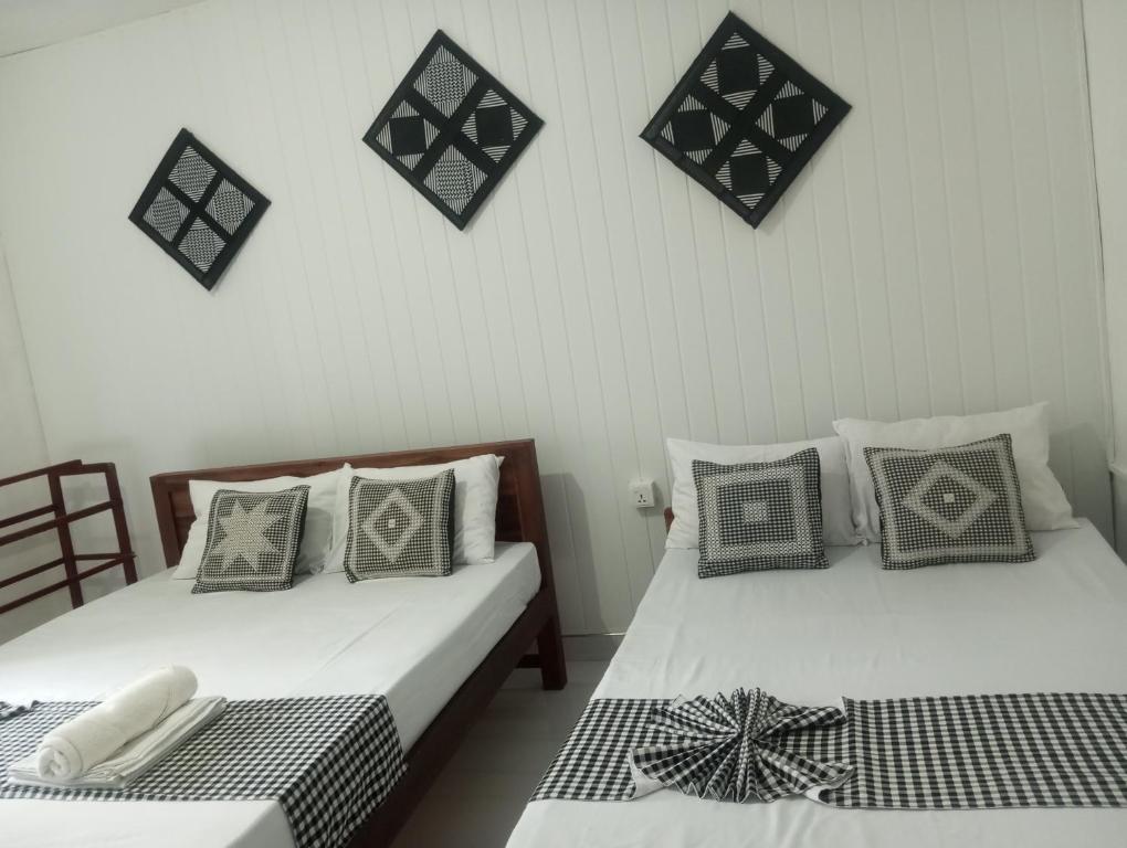 Postel nebo postele na pokoji v ubytování Zuni`s Home Stay