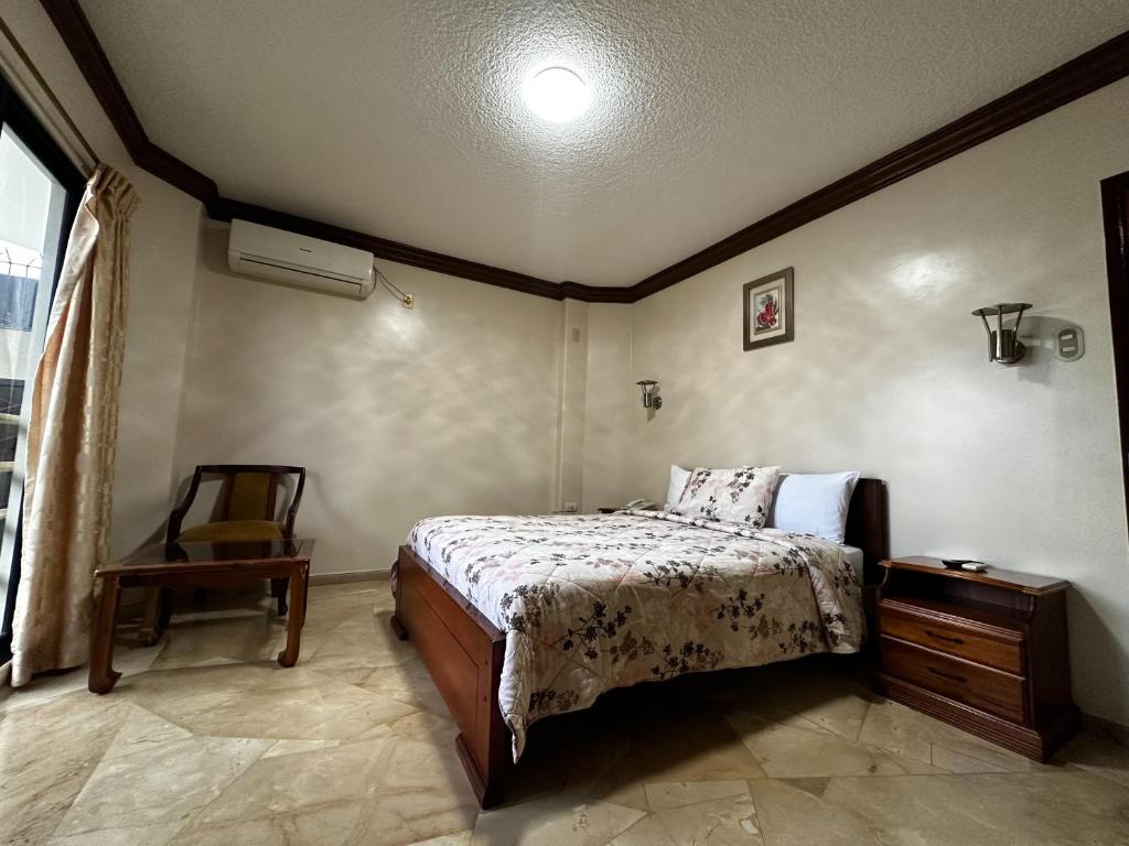 Postel nebo postele na pokoji v ubytování Hotel Bucaneiro