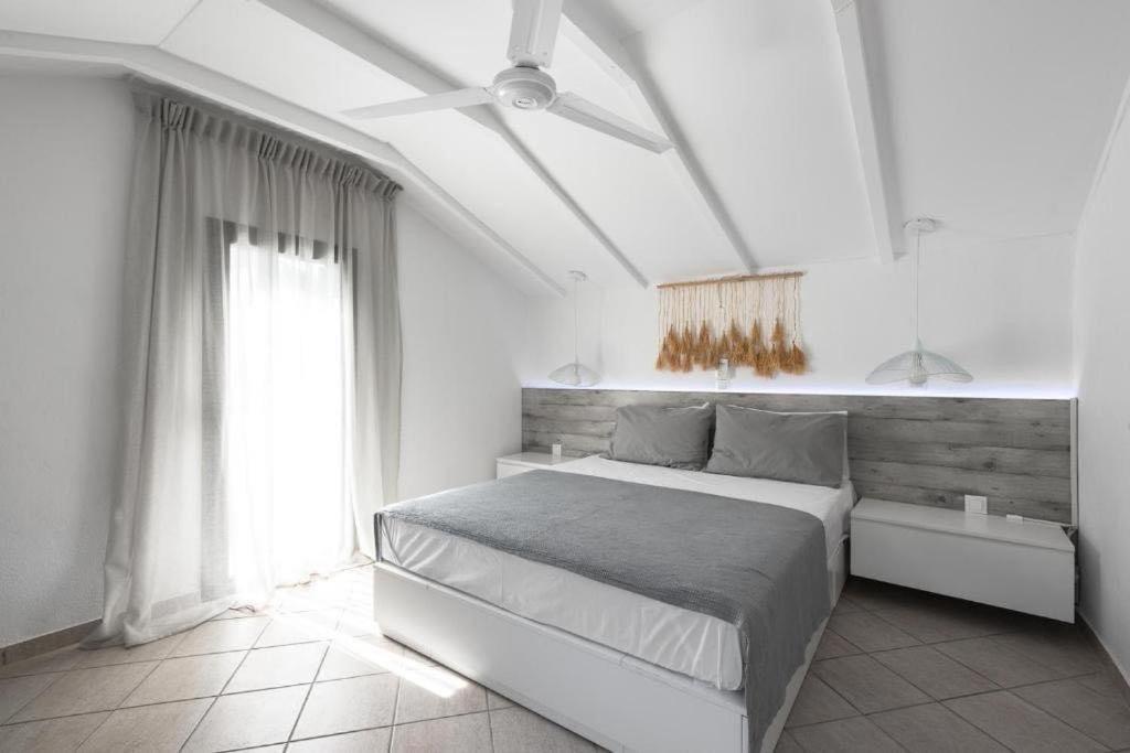 A bed or beds in a room at Elani Cactus House