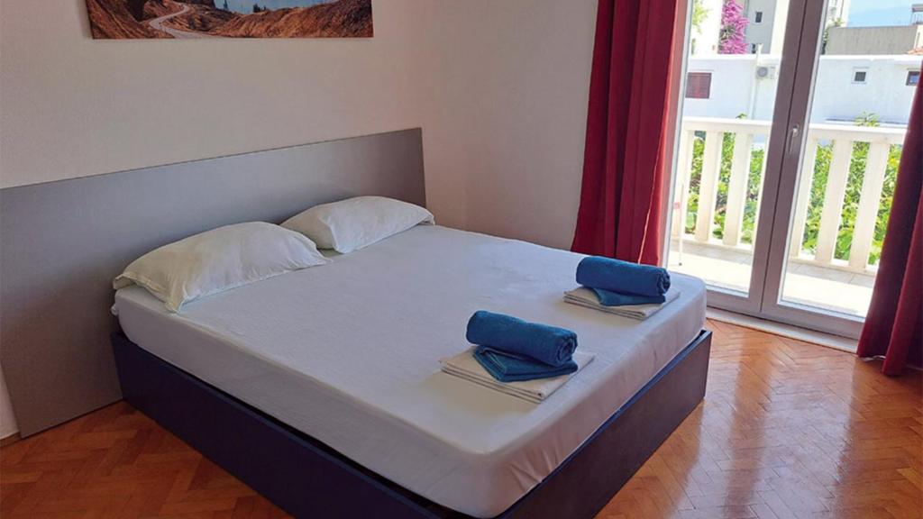 Postel nebo postele na pokoji v ubytování Pansion Palme