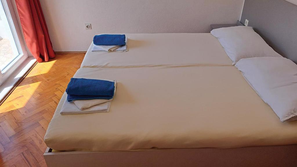 Postel nebo postele na pokoji v ubytování Pansion Palme
