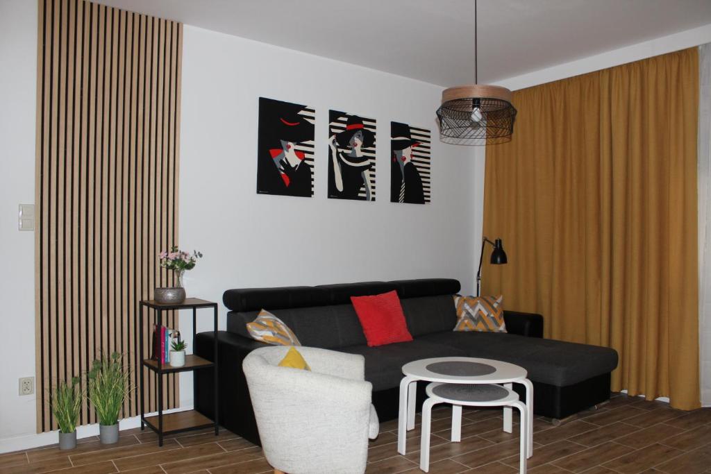 Posedenie v ubytovaní Sunny Adventure Baltic Apartament