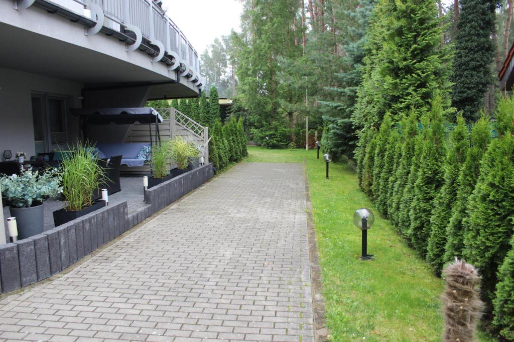 Vonkajšia záhrada v ubytovaní Sunny Adventure Baltic Apartament