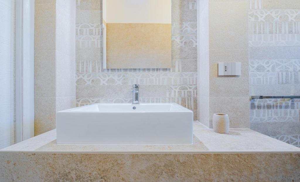 A bathroom at Villa Falcone - Luxury Pool Sea View