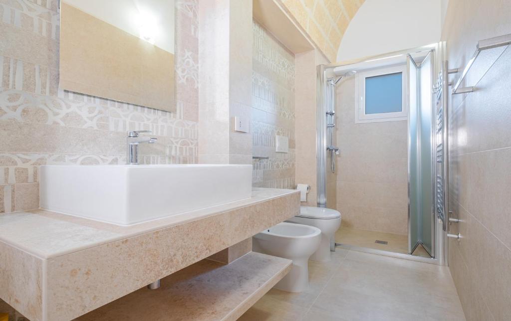A bathroom at Villa Falcone - Luxury Pool Sea View