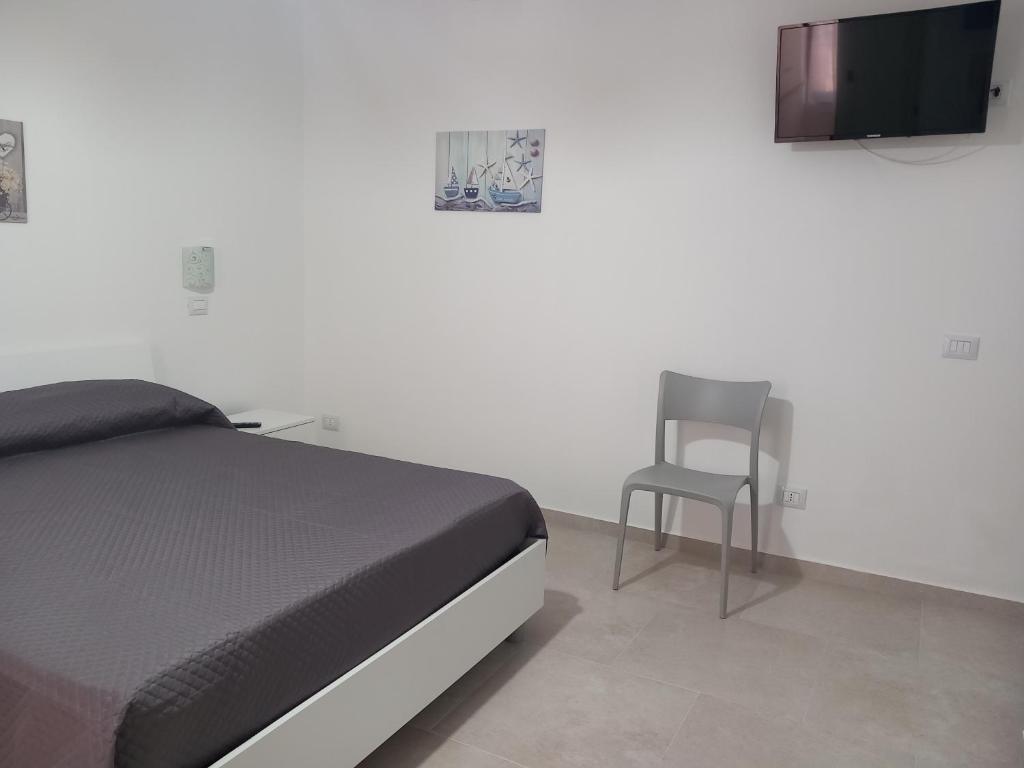 Postel nebo postele na pokoji v ubytování Appartamento La Dama