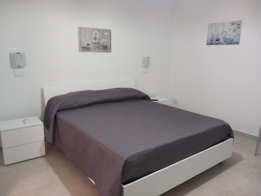 Postel nebo postele na pokoji v ubytování Appartamento La Dama