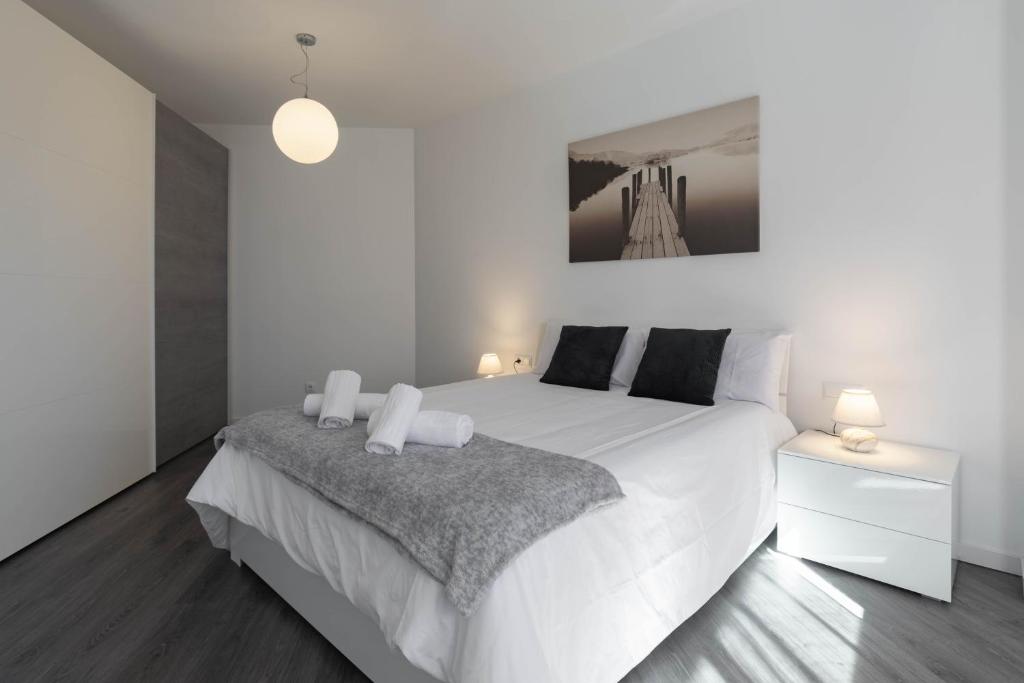Postel nebo postele na pokoji v ubytování Apartamento Carvajal
