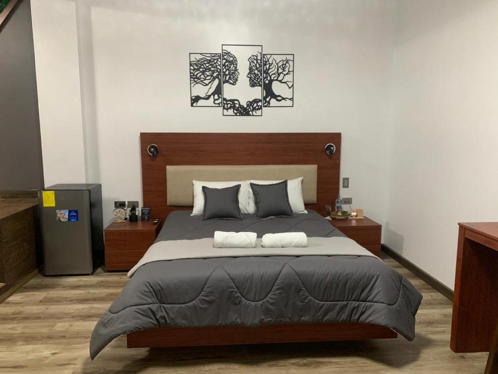 Postel nebo postele na pokoji v ubytování Hotel Sacha Golden