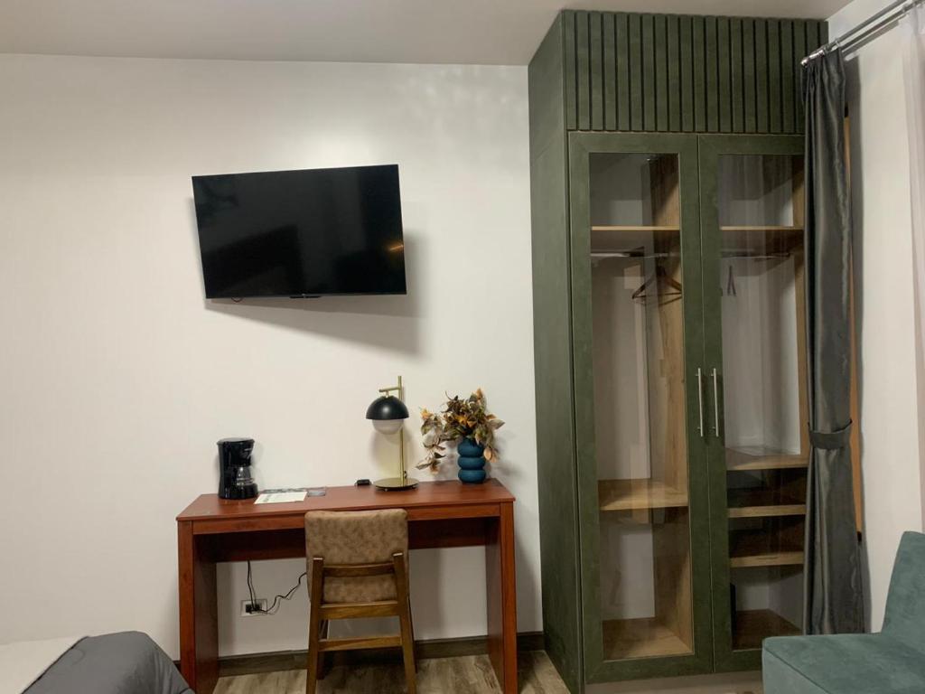 TV a/nebo společenská místnost v ubytování Hotel Sacha Golden