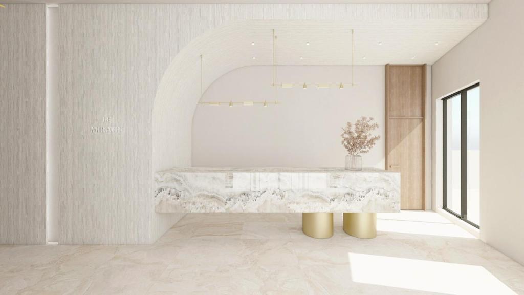 a marble table in a room with a window at La Mirage Hotel in Tsilivi
