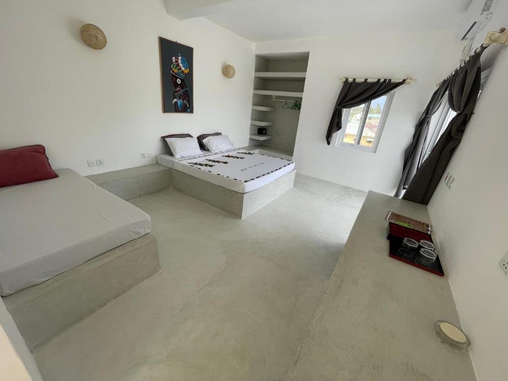 TV a/nebo společenská místnost v ubytování Watamu Ascot Resort