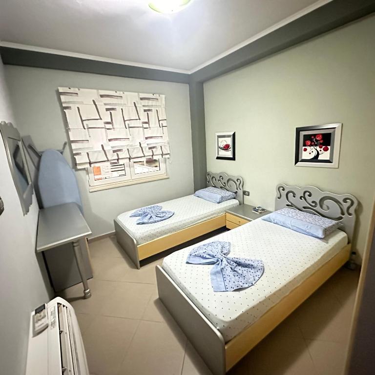 Postel nebo postele na pokoji v ubytování Villa Shera
