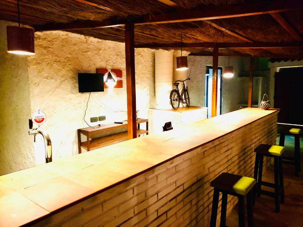 TV a/nebo společenská místnost v ubytování Casa rural cueva El Nido