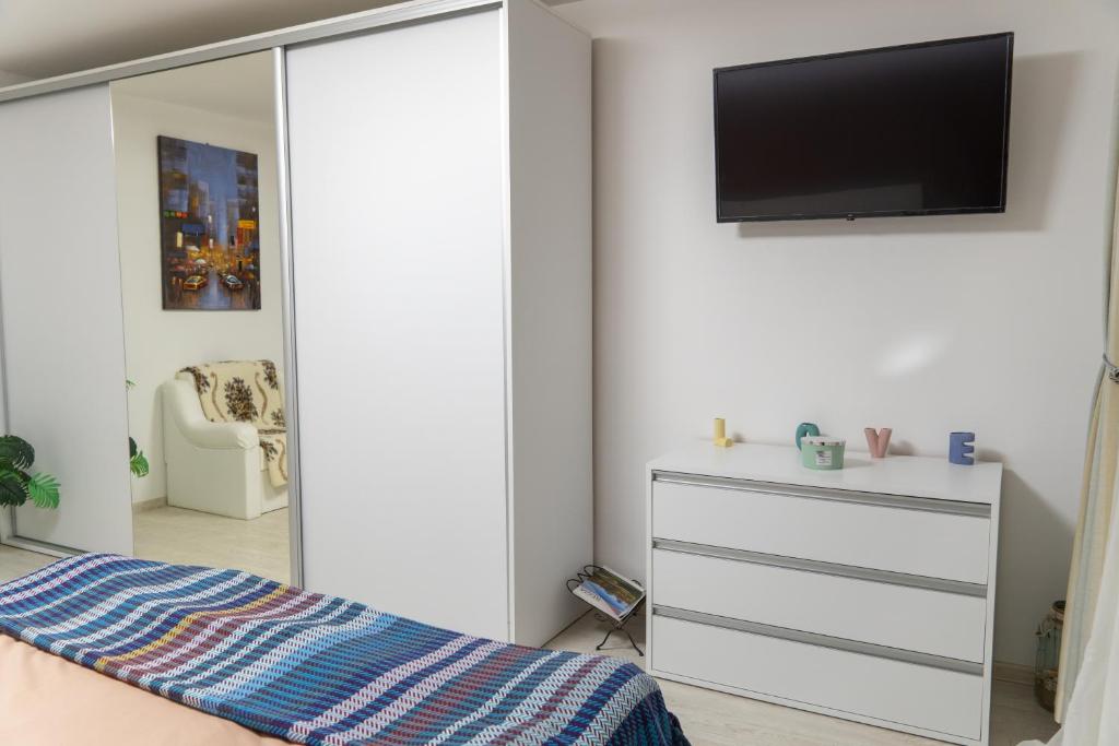 TV a/nebo společenská místnost v ubytování Apartament Lucas