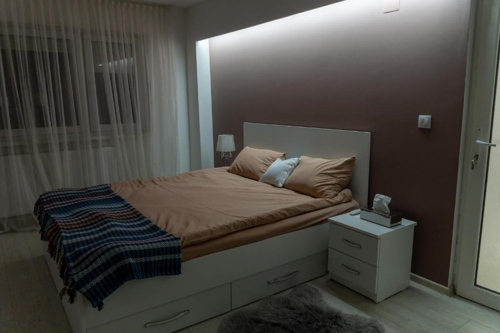 Postel nebo postele na pokoji v ubytování Apartament Lucas