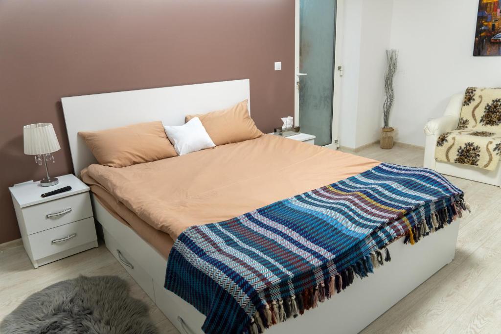 Postel nebo postele na pokoji v ubytování Apartament Lucas