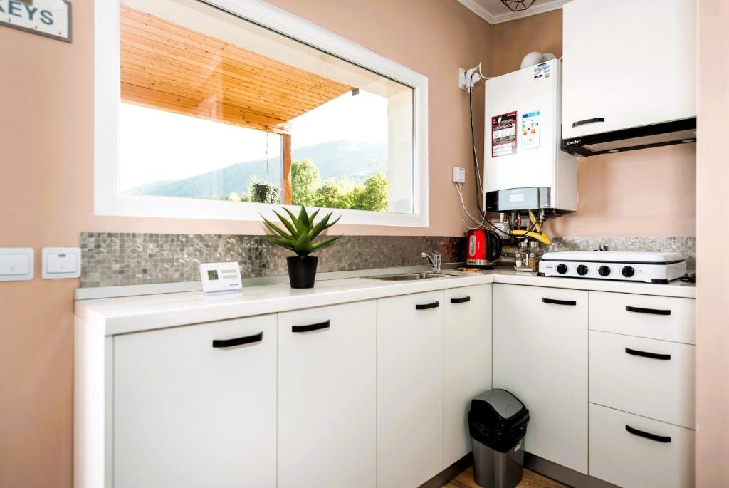 Kuchyň nebo kuchyňský kout v ubytování Beaumont Lodges