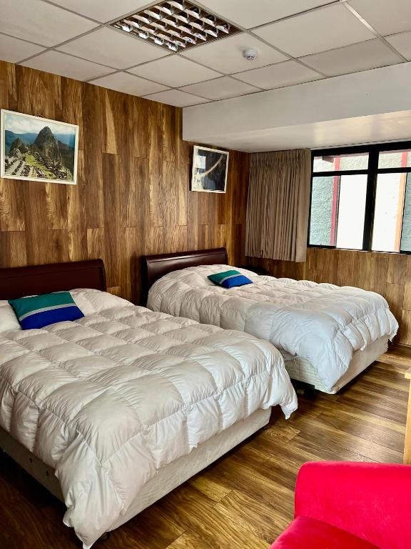 Voodi või voodid majutusasutuse Magar Hostel Bar toas