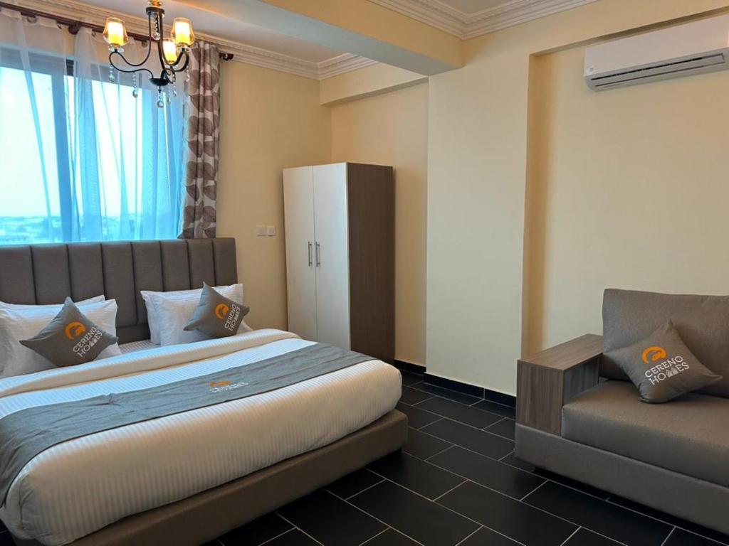 Ένα ή περισσότερα κρεβάτια σε δωμάτιο στο Cereno Homes Accra