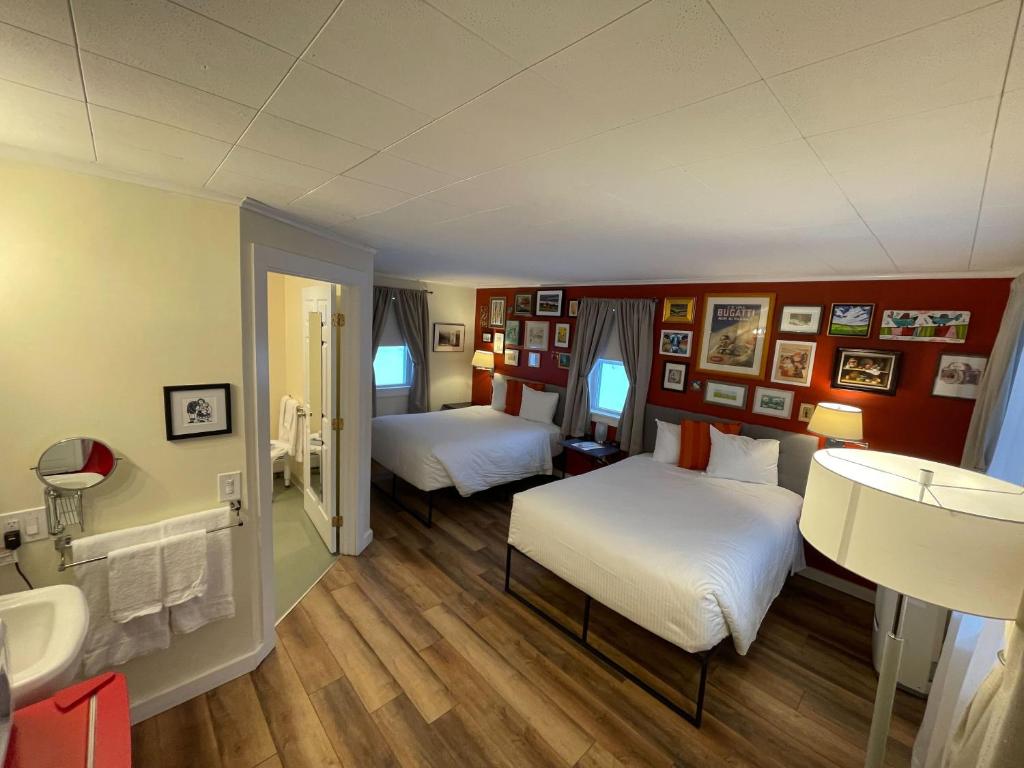 Postel nebo postele na pokoji v ubytování Sleep Woodstock Motel