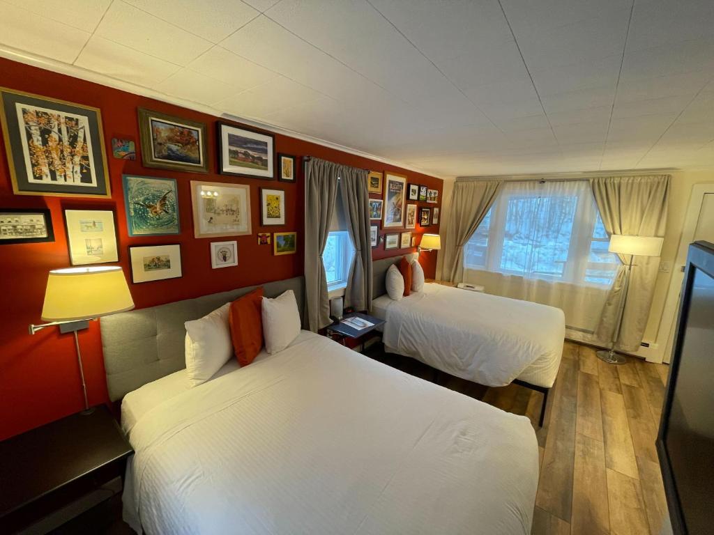 Postel nebo postele na pokoji v ubytování Sleep Woodstock Motel